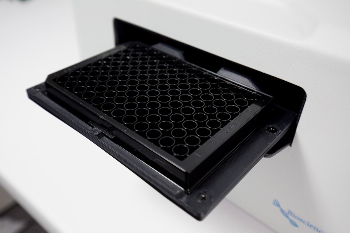 Close-up of 96-well plate on Fluorowatcher tray